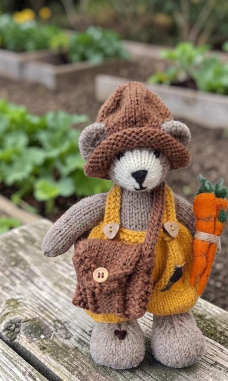 Thorne Ash, Pebblewood Village Messenger, displayed with his hand-knitted clothing, satchel and handmade felt envelope and letter.