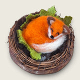 Top-down view of the twig wreath and wood slice, showing how the piece sits