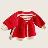 Back view of red merino wool baby matinee coat with natural ecru trim