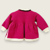 Back view of magenta merino wool baby matinee coat