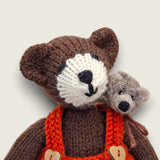 Close-up of Bracken Moss without his hat and satchel, showing the hand-knitted face and individually finished features.