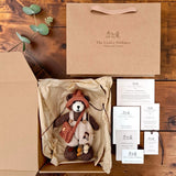Bramble Rowan Pebblewood collectible bear presented in kraft packaging with Certificate of Authenticity, Resident Card and care details.