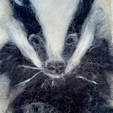 Dara needle felted badger wall art close up detail showing bold black and white markings in merino wool - handmade in Co. Meath Ireland