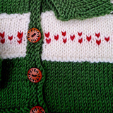 Red intarsia hearts and wooden buttons on green merino toddler cardigan