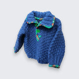 Hand knitted blue alpaca wool baby jumper left side view - alpaca and wool blend, one of a kind, The Crafty Pebblers Ireland