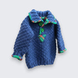 Hand knitted blue alpaca wool baby jumper right side view - textured stitch, tartan trim sleeve edge, handmade in Co. Meath Ireland