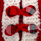 Hand-covered tartan buttons and knitted loops on red merino baby coat