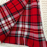 Close-up of red tartan cotton lining inside the baby matinee coat
