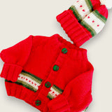 Red merino newborn cardigan and hat showing coordinating heart detail