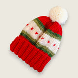 Red merino newborn hat with green and ivory heart detail and wool pompom