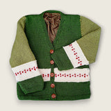 Green merino wool toddler cardigan with heart detail and printed check lining