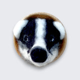 Needle felted badger wall art detail view showing distinctive black and white facial markings - natural wool, Ireland