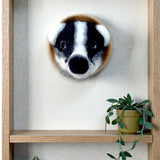 Needle felted badger wall art displayed in home interior - handmade Irish wildlife art by The Crafty Pebblers