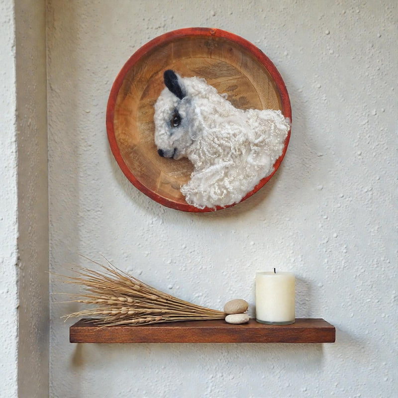 Needle felted sheep portrait in wooden bowl displayed in home interior - handmade Irish fibre art by The Crafty Pebblers

