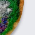 Needle felted sheep wall art showing natural wood grain of round wooden plate mount - handmade in Co. Meath Ireland by The Crafty Pebblers