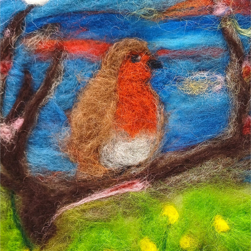 Needle felted wool picture close up detail showing robin on branch with pink blossoms in natural wool - Co. Meath Ireland