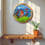 Needle felted wool picture of robin in flowering meadow displayed in home interior - handmade Irish fibre art by The Crafty Pebblers