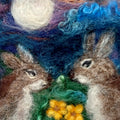 Needle felted wool picture close up detail showing two rabbits and yellow flowers in dyed sheep locks and merino wool - Co. Meath Ireland