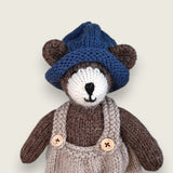 Pebblewood Resident wearing hand knitted blue wool hat