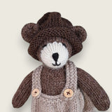 Pebblewood Resident wearing hand knitted brown wool hat