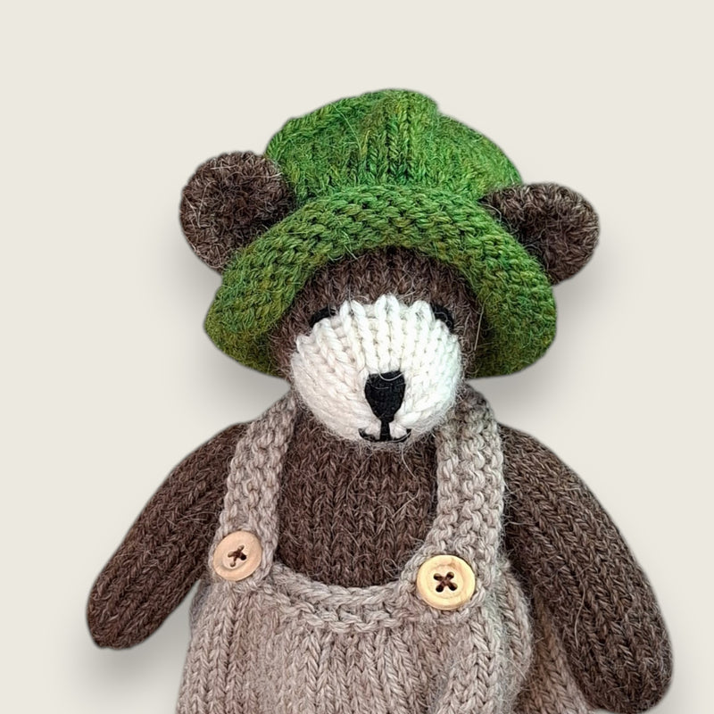 Pebblewood Resident wearing hand knitted green wool hat