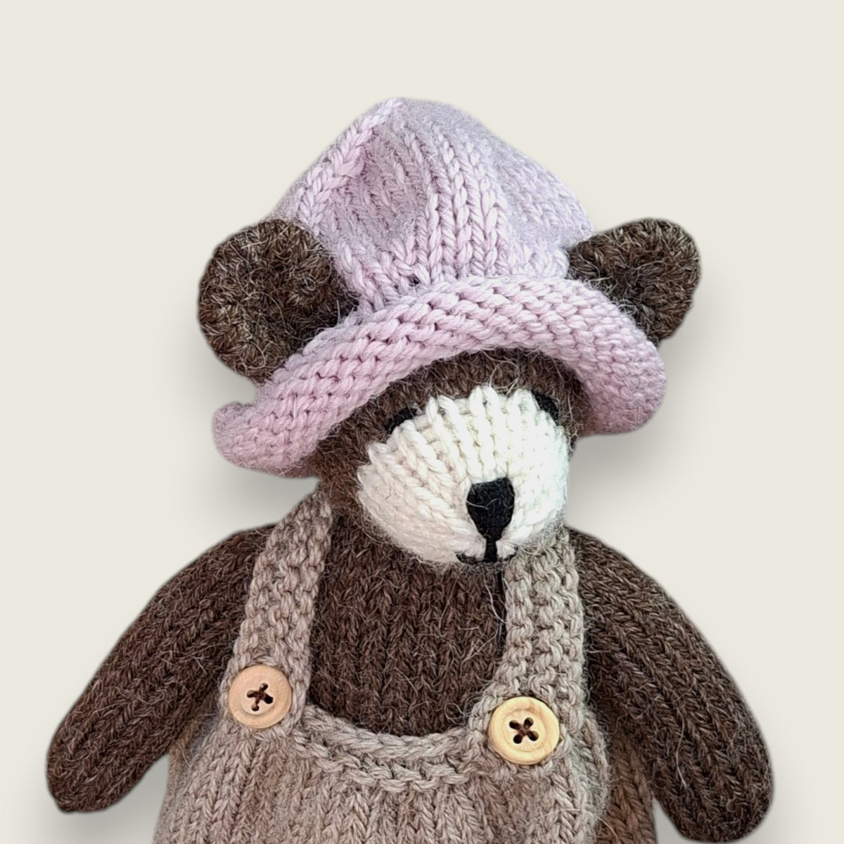Pebblewood Resident wearing hand knitted pink wool hat