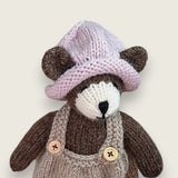 Pebblewood Resident wearing hand knitted pink wool hat