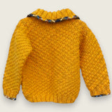 Back of mustard alpaca and wool children's jumper with tartan-trimmed collar.