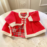 Red merino wool baby matinee coat styled in a warm cream setting