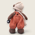 Rear view of Swallow Flight handmade collectible bear showing hand-knitted construction.