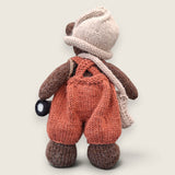 Rear view of Swallow Flight handmade collectible bear showing hand-knitted construction.