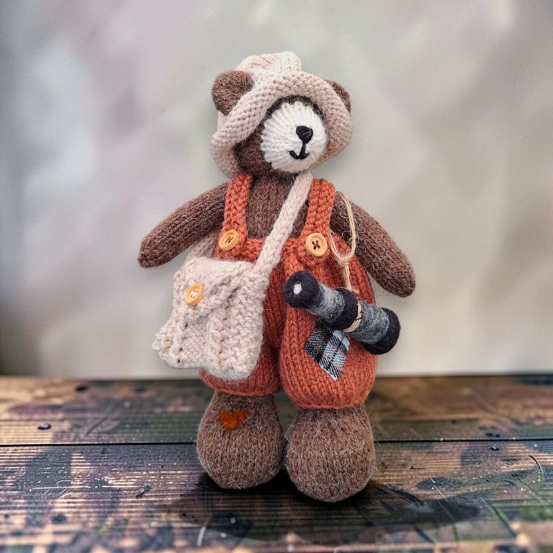 Swallow Flight, a handmade Pebblewood collectible bear with knitted hat, dungarees, satchel and needle-felted telescope accessory.