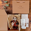 Swallow Flight Pebblewood collectible bear presented in kraft packaging with Certificate of Authenticity, Resident Card and care details.