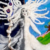 The Cailleach figure in white wool with her staff and streaming hair