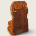 Back view of The Woodlander lime wood sculpture showing the natural timber and fitted wire for wall hanging.