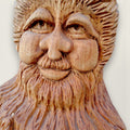 Close-up of The Woodlander showing the individually hand-carved eyes, nose, cheeks, beard and textured hair.