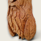 Close-up of The Woodsman showing the individually hand-carved facial features, moustache, beard and detailed cap.