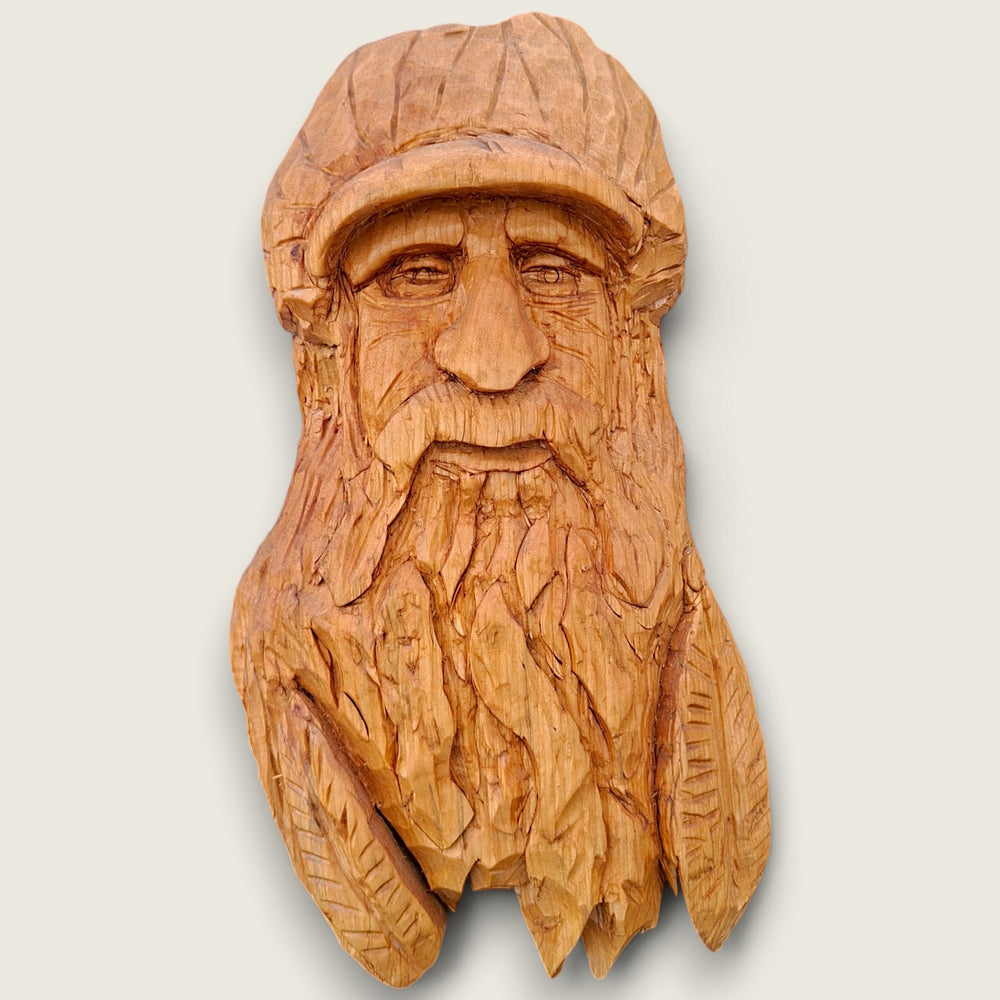 The Woodsman original hand-carved lime wood sculpture by Joe of The Crafty Pebblers in the Boyne Valley, Ireland.
