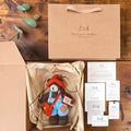 Thorne Ash Pebblewood collectible bear presented with kraft packaging, Certificate of Authenticity, Resident Card and care details.