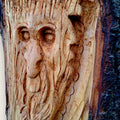 Close-up of Woodland Face showing Joe's hand-carved facial details, tool marks and natural lime wood grain.